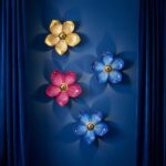 Wall Lamp Flower Magenta, shown mounted in a bedroom setting