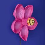 Wall Lamp Flower Magenta, shown mounted in a bedroom setting