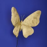 Wall Lamp Butterfly Gold, shown mounted in a living room