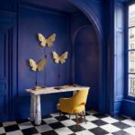 Wall Lamp Butterfly Gold, shown mounted in a living room