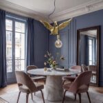 Ceiling Lamp Duck Gold, shown mounted in a living room