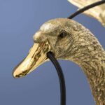 Ceiling Lamp Duck Gold, shown mounted in a living room