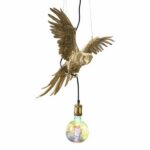 Ceiling Lamp Parrot Gold, shown mounted over a dining table