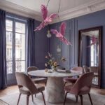 Ceiling Lamp Parrot Pink, shown mounted over a dining table