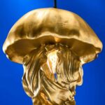 Ceiling Light Jellyfish Gold, shown mounted in a hallway