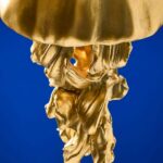 Ceiling Light Jellyfish Gold, shown mounted in a hallway