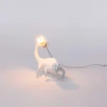 Table Lamp Chameleon Still, shown on a desk or shelf