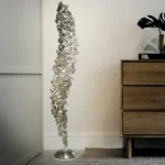 Silver floor lamp, close-up of overlapping petals