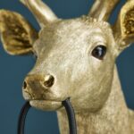 Wall Lamp Deer Gold, shown mounted in a nursery or hallway