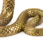 Gold snake sculpture in cast aluminum