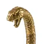 Close-up of gold snake sculpture scale detail