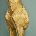 Floor Lamp Giraffe Gold, close-up detail of the shiny gold finish