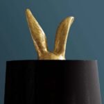 Floor Lamp Rabbit Gold, shown in a living room setting