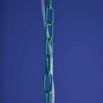 Glass Chandelier Aurora Blue, shown mounted over a dining table