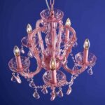Glass Chandelier Aurora Pink, shown mounted over a dining table