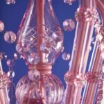 Glass Chandelier Aurora Pink, shown mounted over a dining table