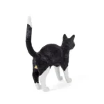 Table Lamp Cat Standing Black and White, shown on a console table