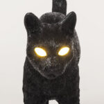 Table Lamp Cat Standing Black, shown on a console table
