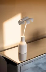 Table Lamp Palm Leaf, shown on a windowsill