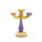 Purple resin eggplant-shaped candelabra, front view