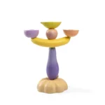 Purple resin eggplant-shaped candelabra, front view