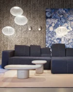 Globe floor lamp illuminated, showing woven texture