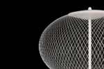 White globe floor lamp with woven sphere, front view