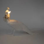 Table Lamp Peacock White, shown in a living room