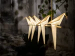 Bird chandelier in brass and white, front view