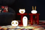 Rabbit lamp illuminated, showing warm glow