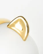 Detail of the gilded porcelain face accents