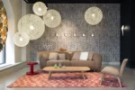 Woven pendant light illuminated, showing lattice glow