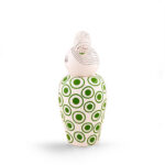 Small lidded keepsake vase styled on a nightstand