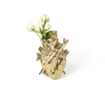 Back view of gold anatomical heart vase