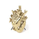 Close-up of gold heart vase anatomical detail
