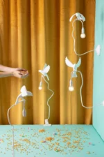 Wall Lamp Sparrow Cruising, shown mounted in a hallway