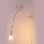 Wall Lamp Sparrow Cruising, shown mounted in a hallway