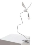 Table Lamp Sparrow with Clamp, shown clamped to a shelf