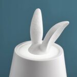 Table Lamp Rabbit LED Matte White, shown with its USB docking station
