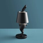 Table Lamp Rabbit LED Matte Black, shown with its USB docking station