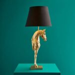 Table Lamp Horse Gold, shown in a living room