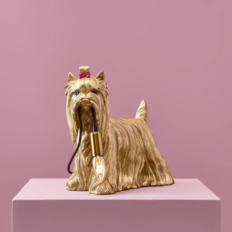 Table Lamp Dog Gold, shown on a sideboard