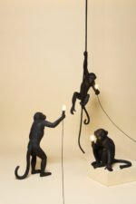 Ceiling Lamp Monkey Black, shown hanging in a living room
