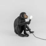 Table Lamp Monkey Sitting Black, close-up detail of the resin finish