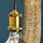 Wall Lamp Ostrich Gold Large, close-up detail of the feather texture