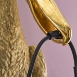 Wall Lamp Pelican Gold, close-up detail of the gold finish
