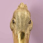 Wall Lamp Pelican Gold, close-up detail of the gold finish