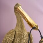 Wall Lamp Pelican Gold, illuminated view