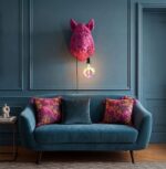 Wall Lamp Wild Boar Magenta, shown mounted in a living room
