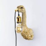 Wall Lamp Ostrich Gold, illuminated view